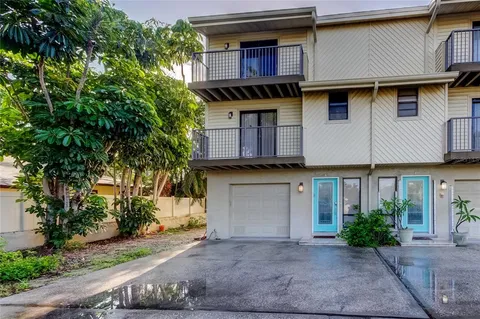 an aerial view of house with yard