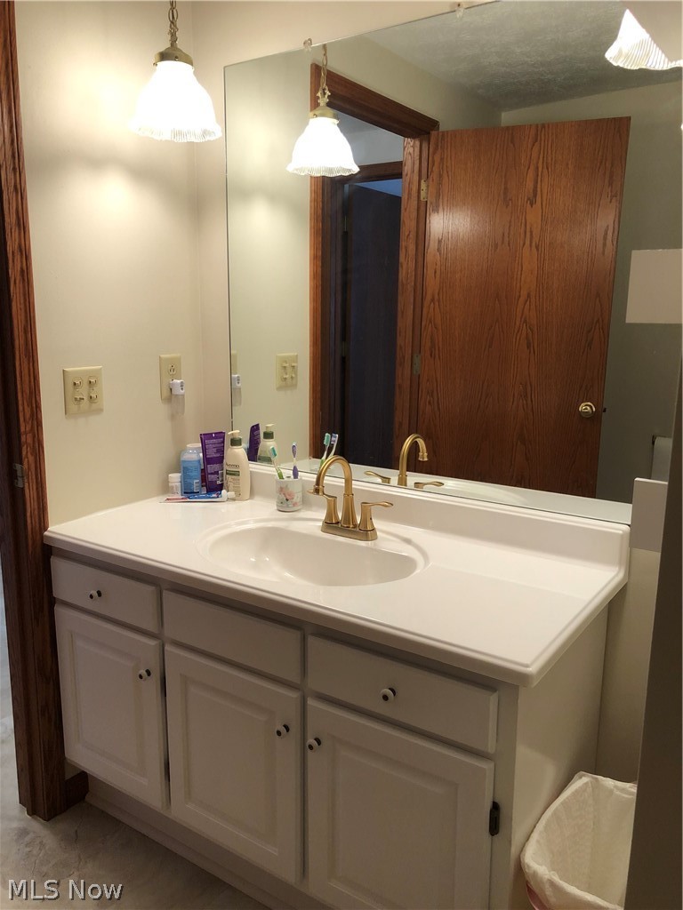 63333 Johnson North Road Bethesda, OH 43719 - Photo 24 of 35 Spacious 2nd full bathroom with four overhead lights and exhaust/heat fan