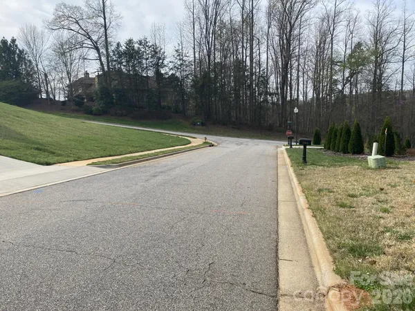 a swimming pool with wooden fence