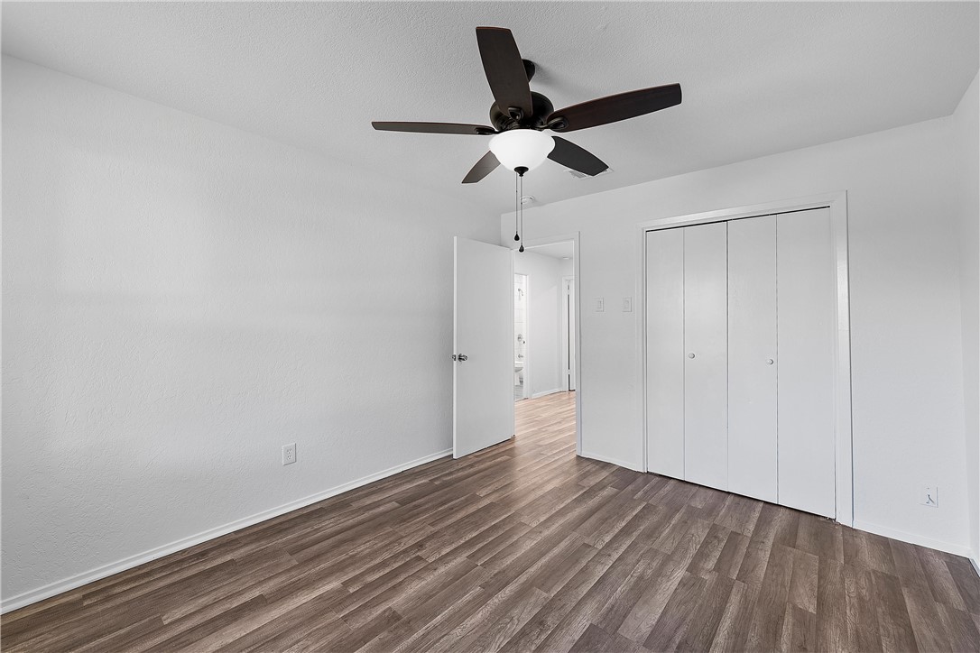 337 Travis Lane Hewitt, TX 76643 - Photo 12 of 22 a view of empty room with wooden floor