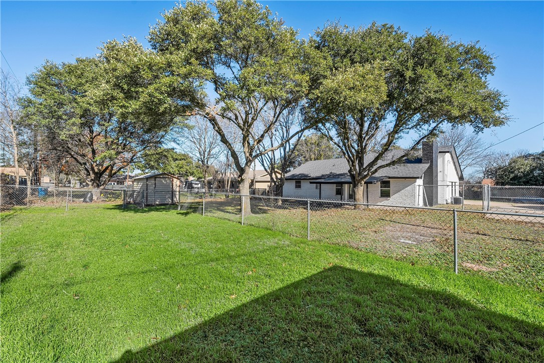 337 Travis Lane Hewitt, TX 76643 - Photo 21 of 22 a view of a house with a big yard