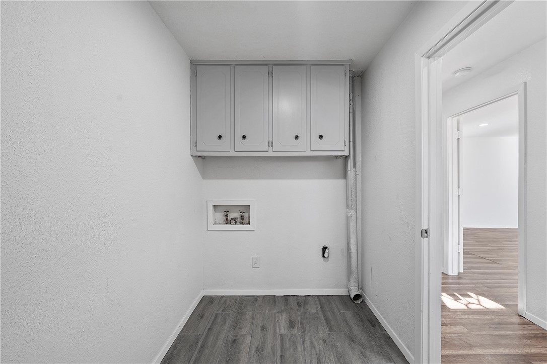 337 Travis Lane Hewitt, TX 76643 - Photo 9 of 22 a view of room with wooden floor