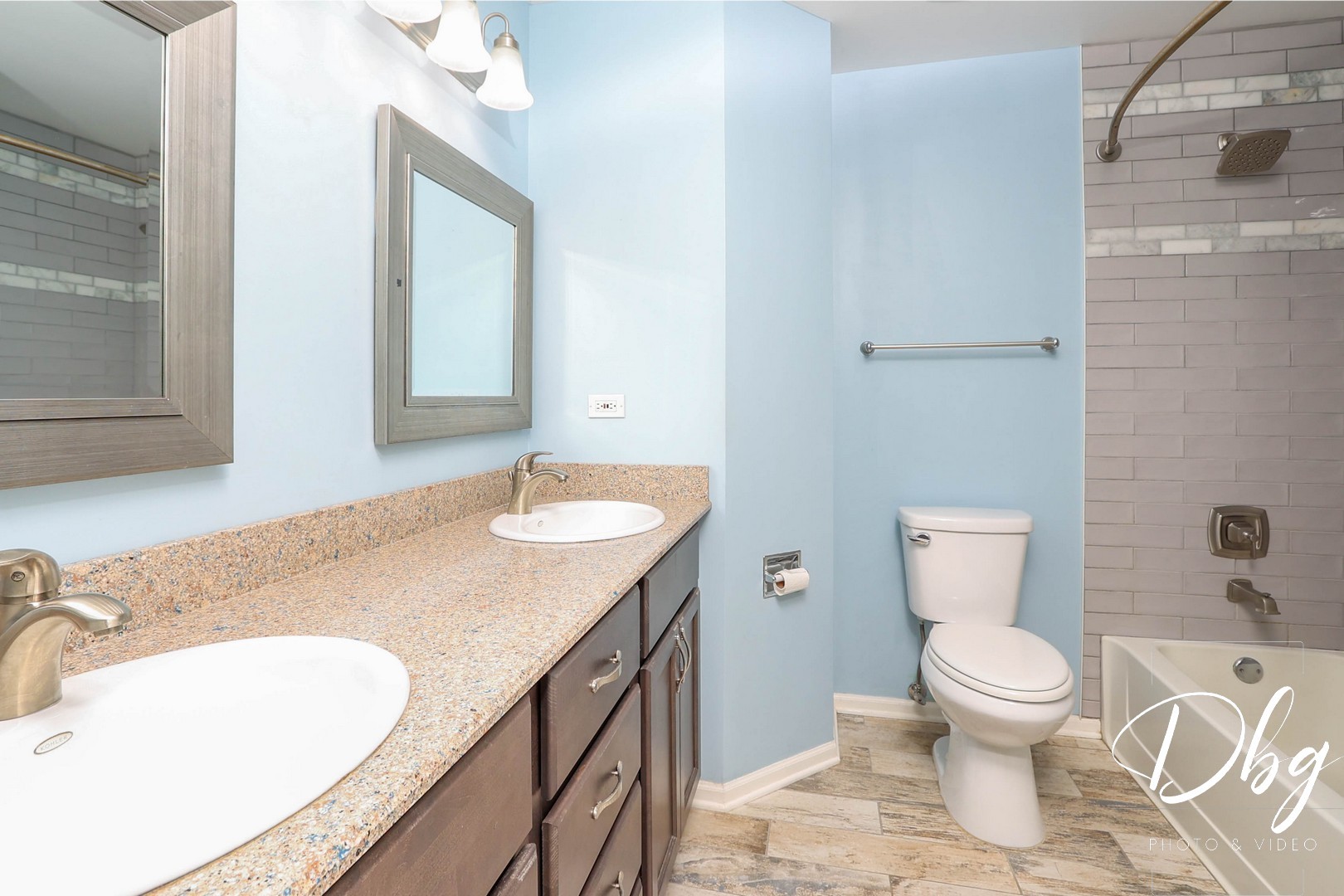 250 Jasmine Circle Lindenhurst, IL 60046 - Photo 14 of 24 a bathroom with a granite countertop sink and a mirror
