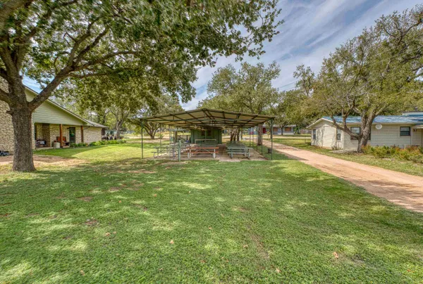 a view of a house with a big yard