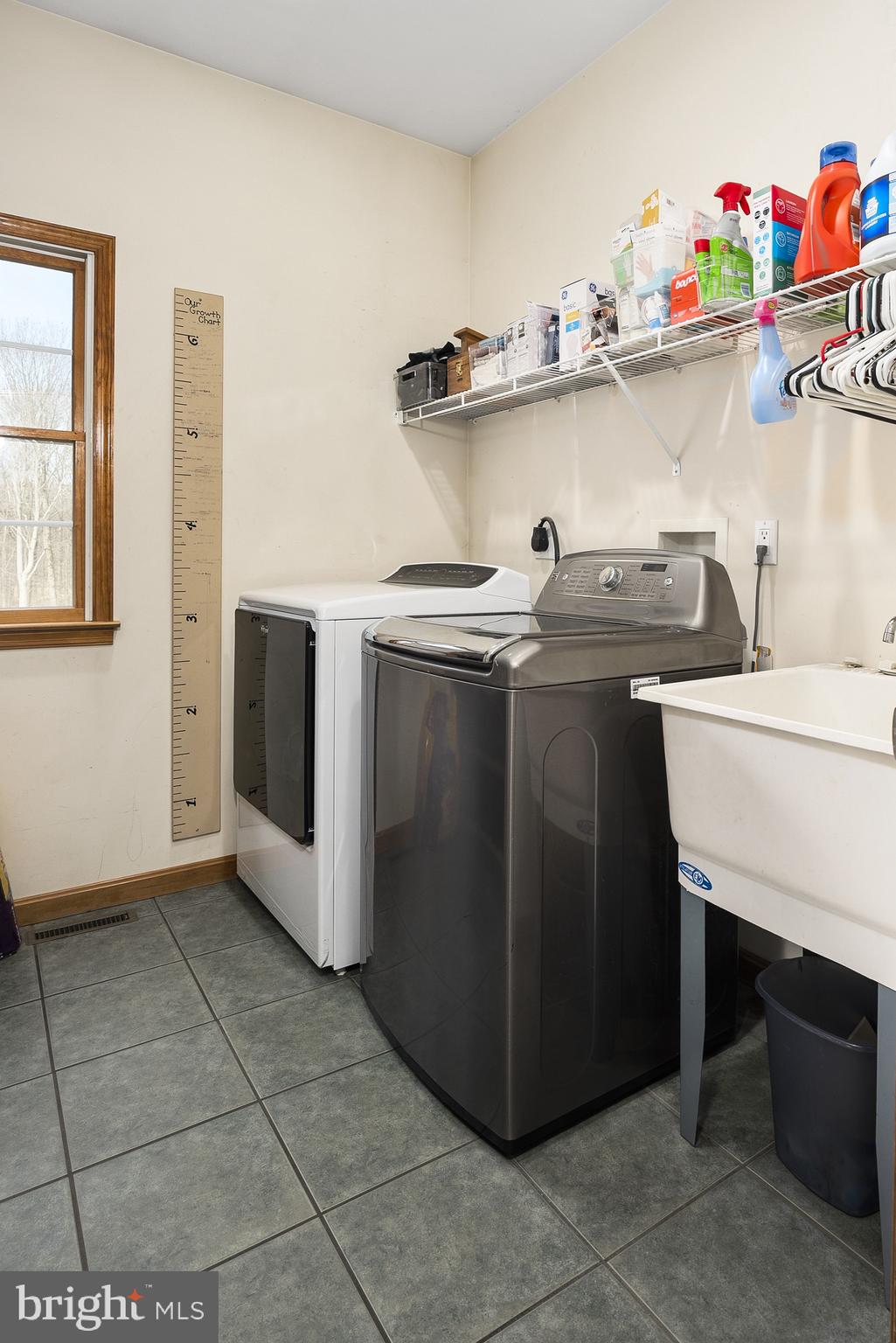 128 Carter Road Elkton, MD 21921 - Photo 24 of 73 Laundry room with sink near garage entrance.