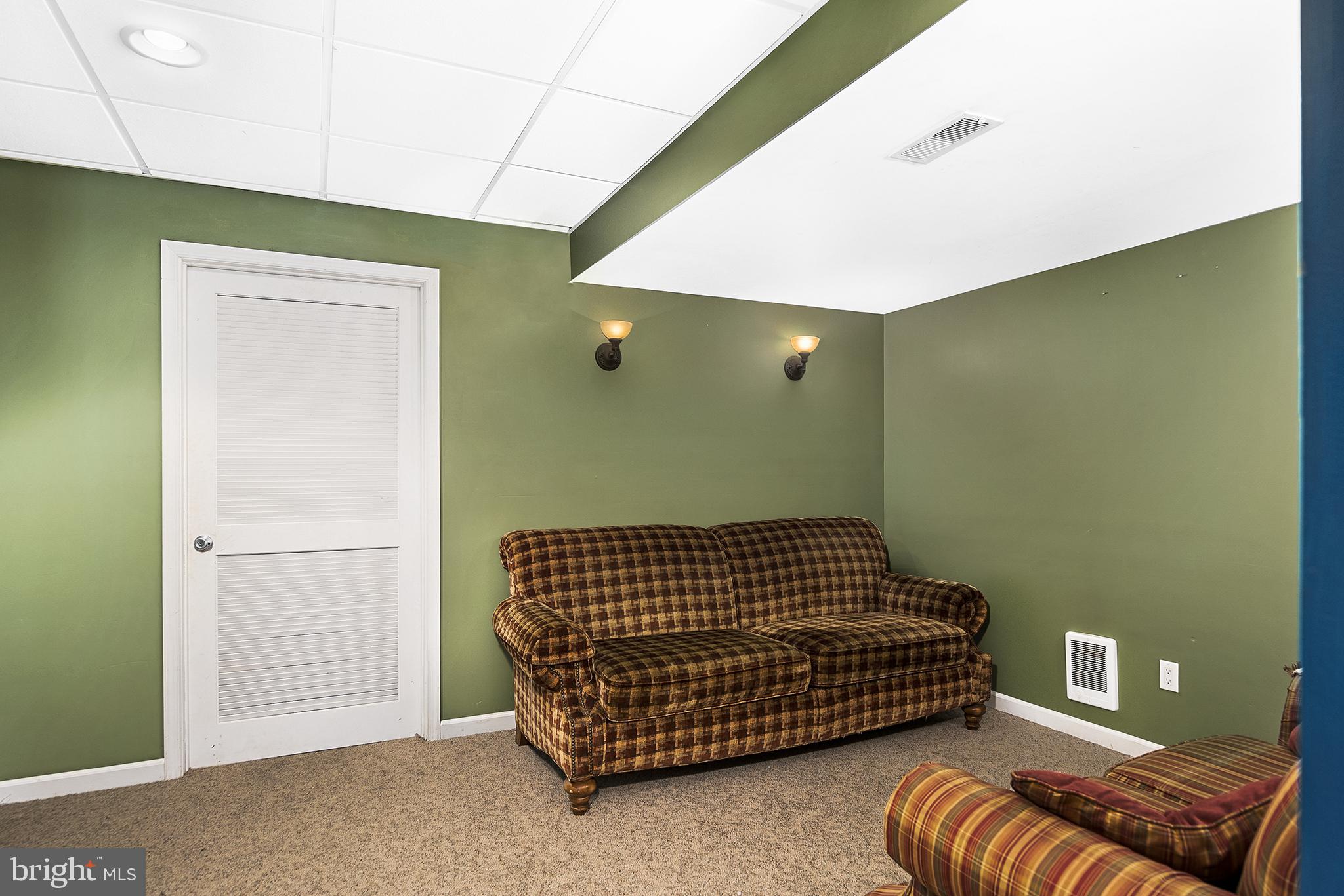128 Carter Road Elkton, MD 21921 - Photo 50 of 73 Reading nook with wall sconces, door to utilities