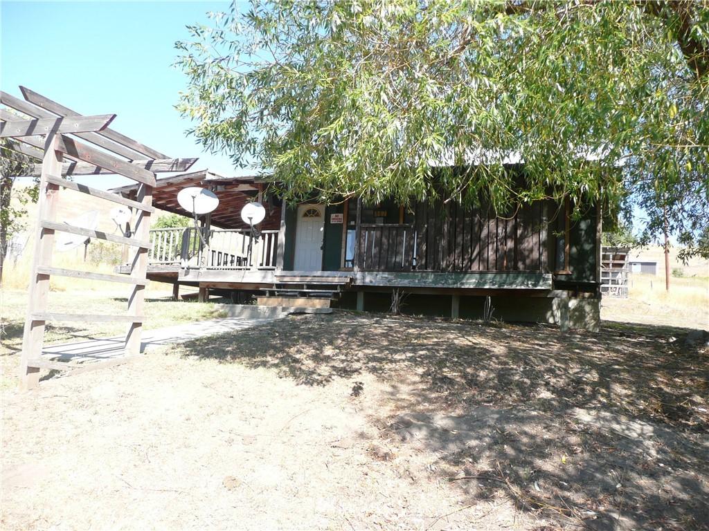 a view of a lake with a house