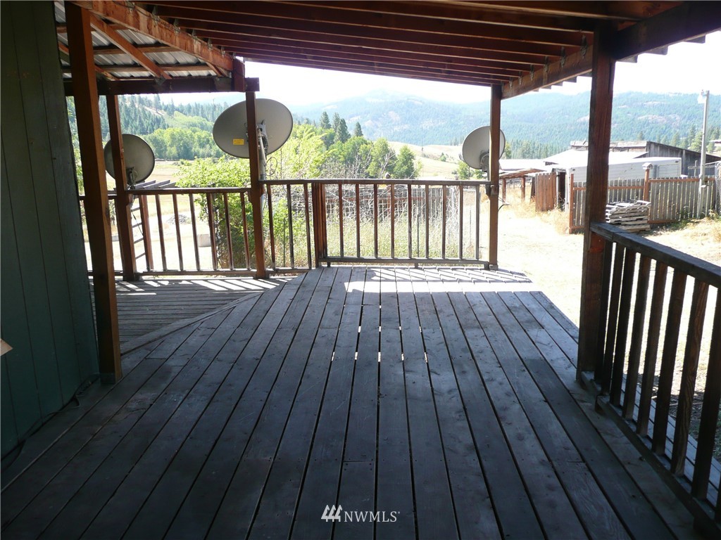 167 Yenter Road Republic, WA 99166 - Photo 6 of 11 a view of balcony with wooden floor