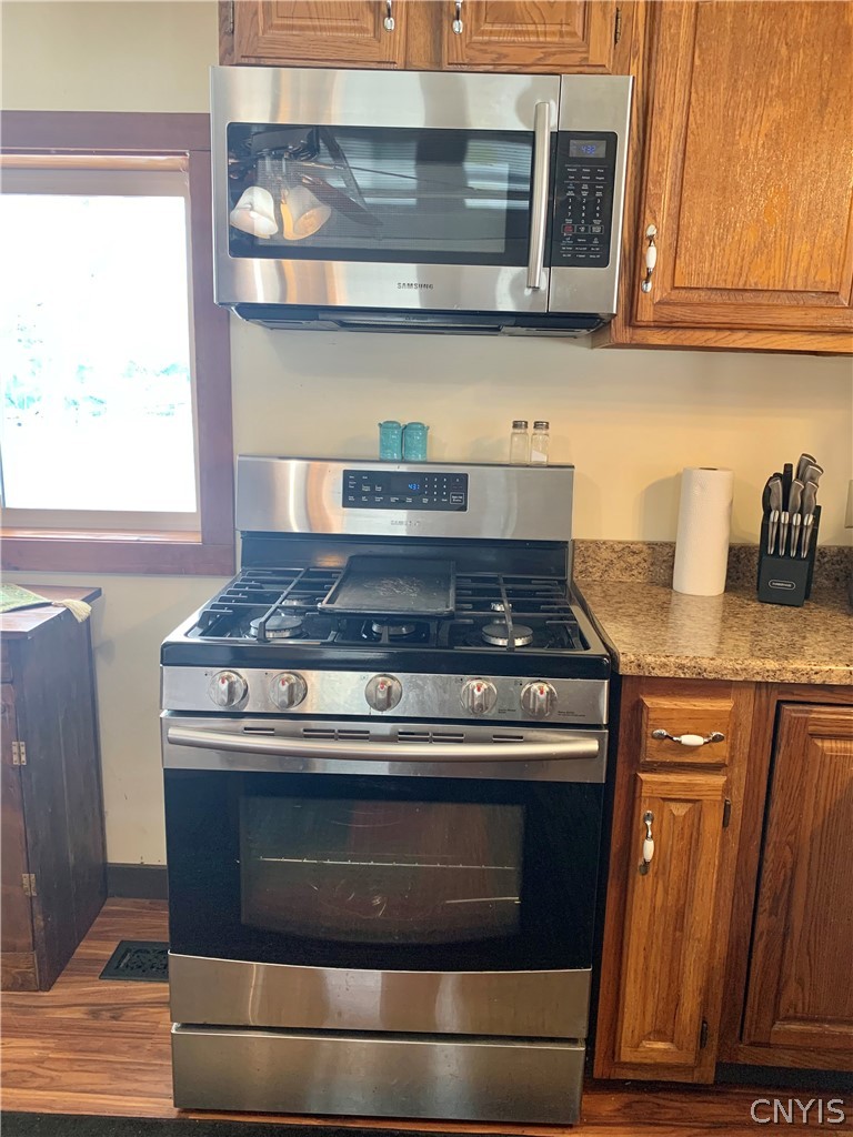 3403 Burke Road Vernon Center, NY 13477 - Photo 7 of 42 .....to the Samsung propane gas stove and microwave...........