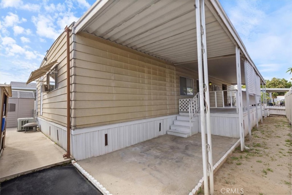 300 North Rampart Street, Unit 195 Orange, CA 92868 - Photo 24 of 25 a view of a house with backyard and bathroom