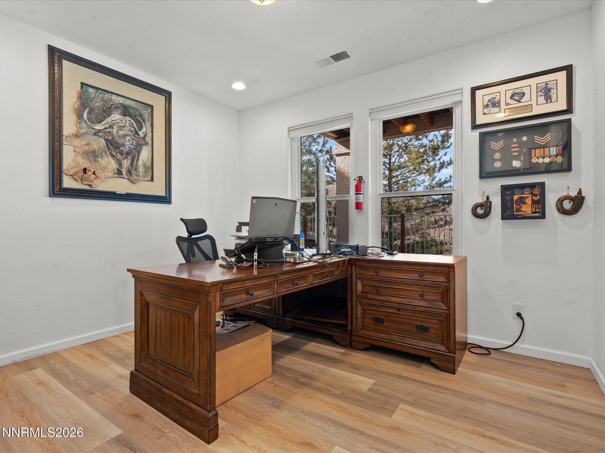 4943 Foxcreek Trail Reno, NV 89519 - Photo 16 of 26 a view of a workspace with furniture and window