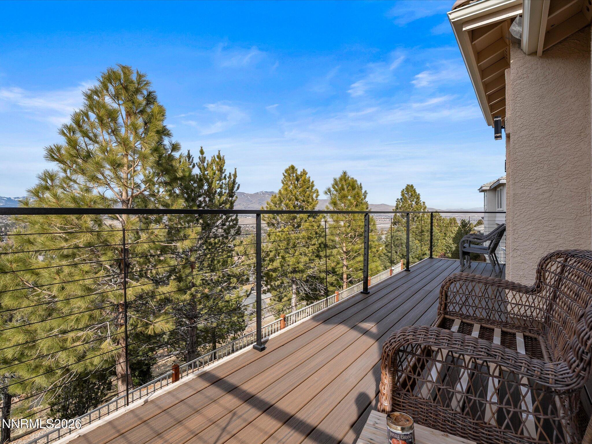 4943 Foxcreek Trail Reno, NV 89519 - Photo 19 of 26 a view of balcony with wooden floor and seating space
