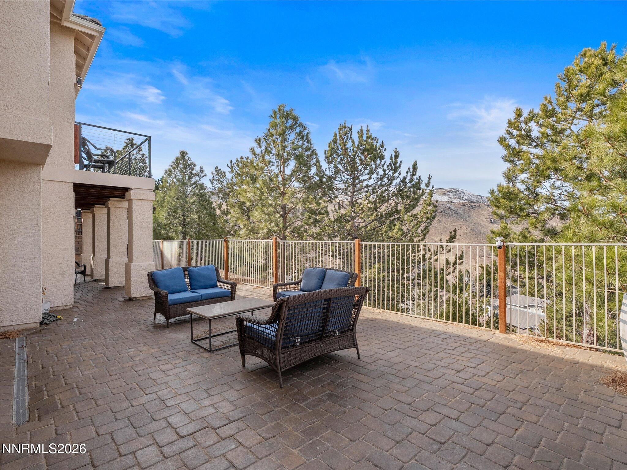 4943 Foxcreek Trail Reno, NV 89519 - Photo 20 of 26 a view of a chairs and tables in the patio