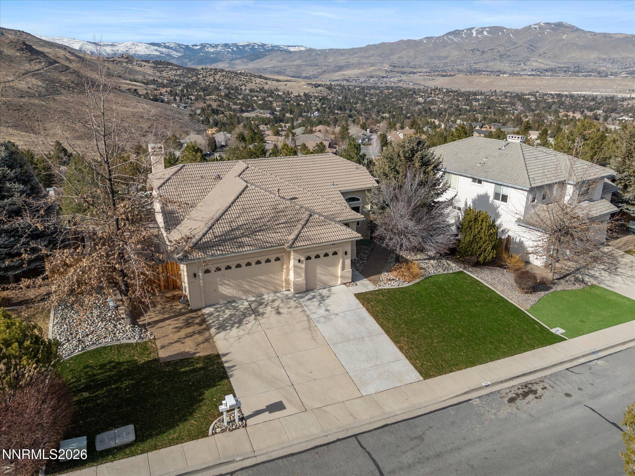 4943 Foxcreek Trail Reno, NV 89519 - Photo 24 of 26 an aerial view of residential houses with outdoor space and trees
