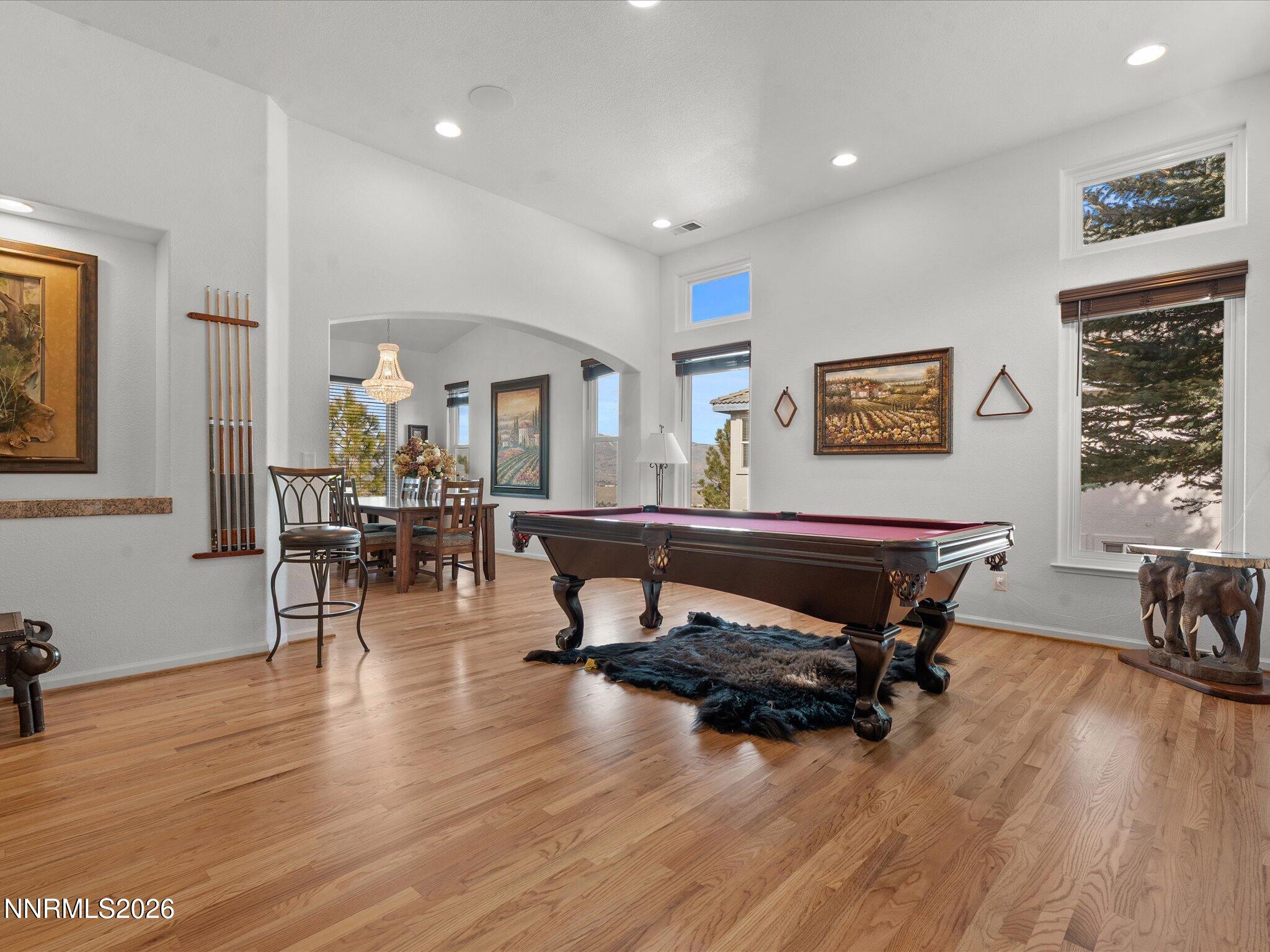 4943 Foxcreek Trail Reno, NV 89519 - Photo 7 of 26 a living room with furniture and a wooden floor