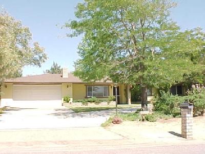 14725 Kinai Road Apple Valley, CA 92307 - Photo 1 of 1 a view of a house with snow on the road