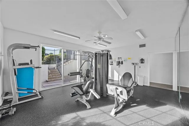 a sign broad in front of flowers