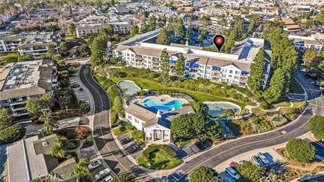 a sign that is sitting in front of a tree