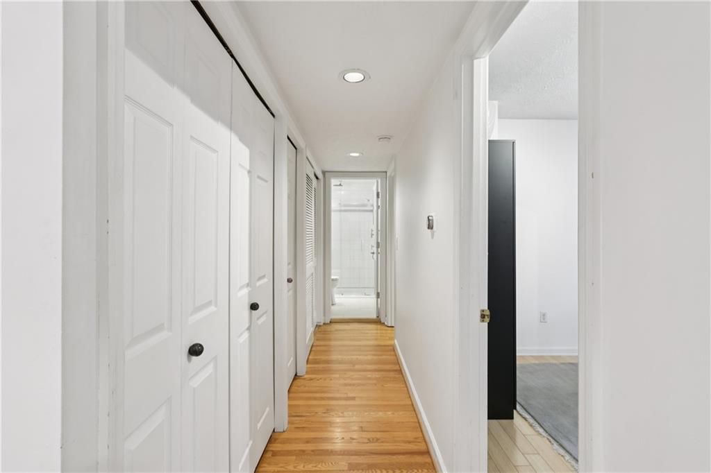 600 South Negley Avenue, Unit 16 Pittsburgh, PA 15232 - Photo 14 of 22 a view of a hallway with white door and stairs