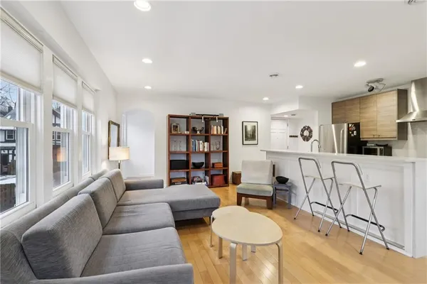 a living room with furniture and a table