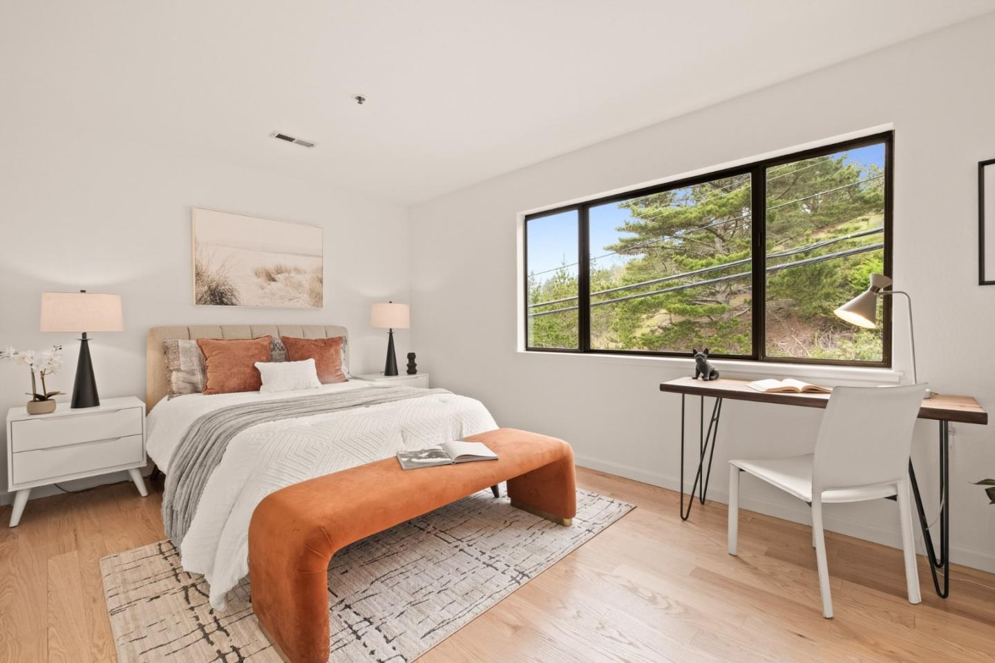 504 Monterey Road, Unit 14L Pacifica, CA 94044 - Photo 26 of 39 a bedroom with a bed and a large window