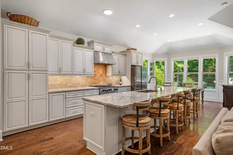 $975,000 | 212 Middlegreen Place, Holly Springs, NC 27540