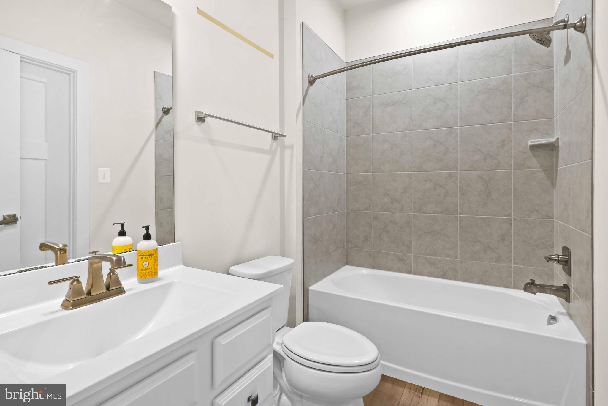 3903 Emory Ridge Road Brandywine, MD 20613 - Photo 15 of 43 a bathroom with a sink toilet and shower