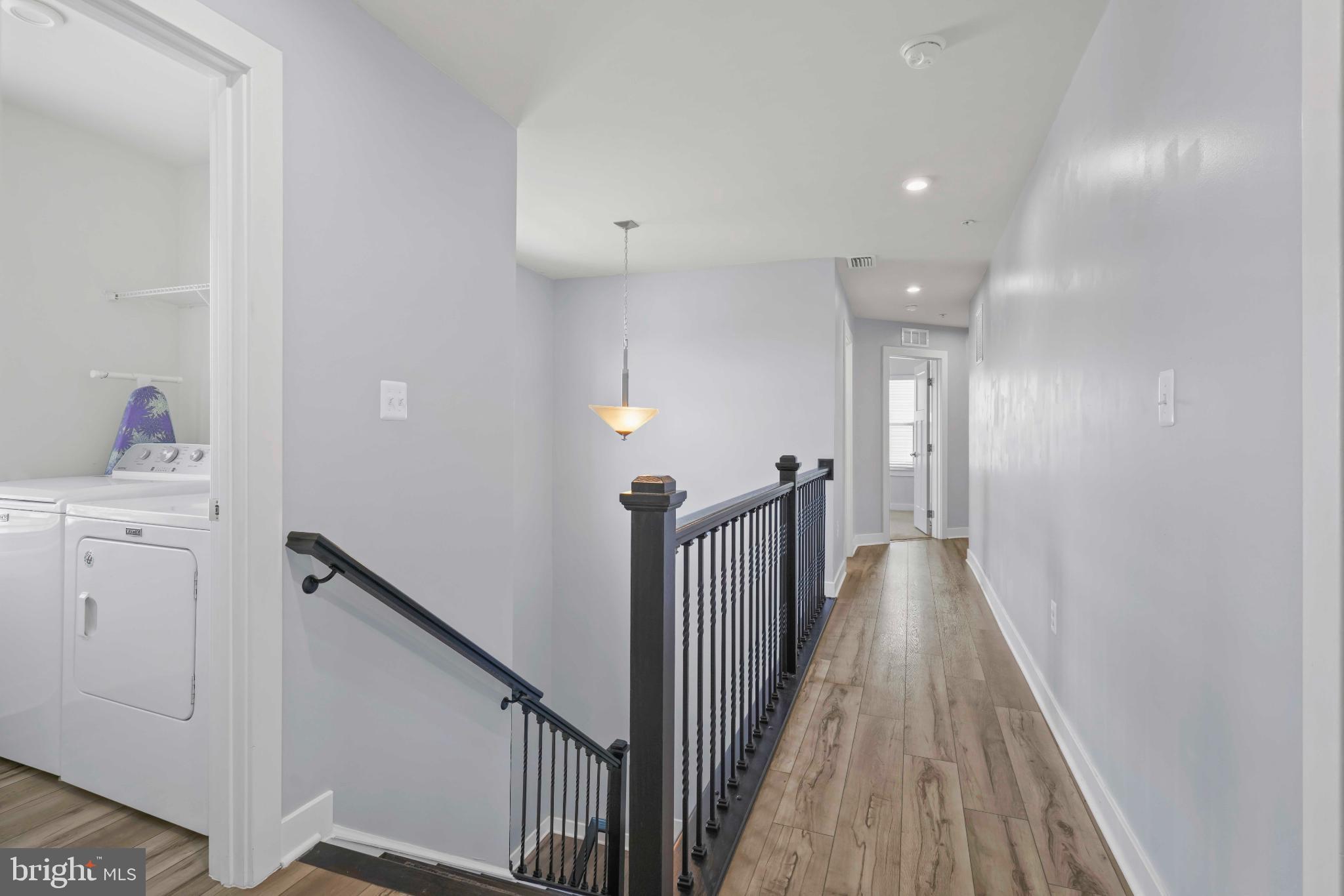 3903 Emory Ridge Road Brandywine, MD 20613 - Photo 16 of 43 a view of a hallway with wooden floor and entryway