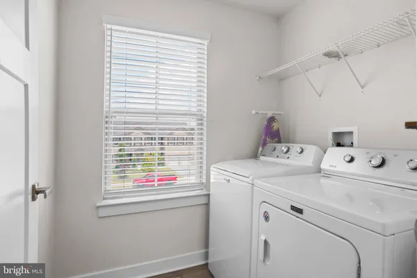 a view of washer and dryer in a utility room