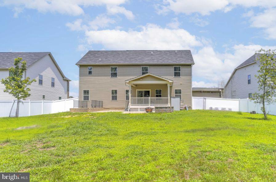 3903 Emory Ridge Road Brandywine, MD 20613 - Photo 33 of 43 a front view of a house with a garden