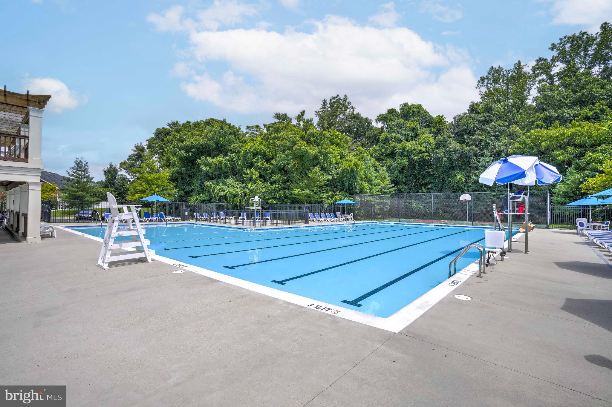 3903 Emory Ridge Road Brandywine, MD 20613 - Photo 41 of 43 a view of a tennis court with tables and chairs