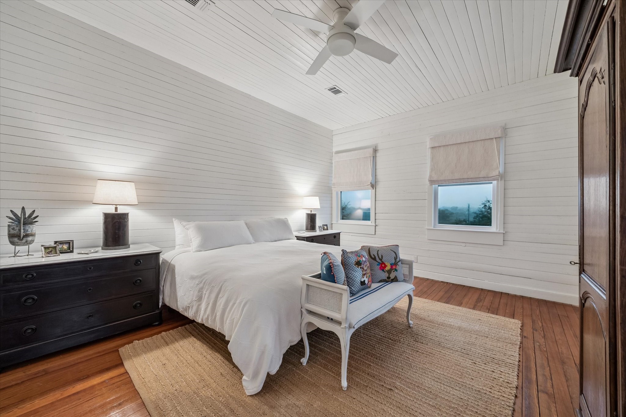 895 South Weyand Road Round Top, TX 78954 - Photo 17 of 37 a bedroom with bed and a window