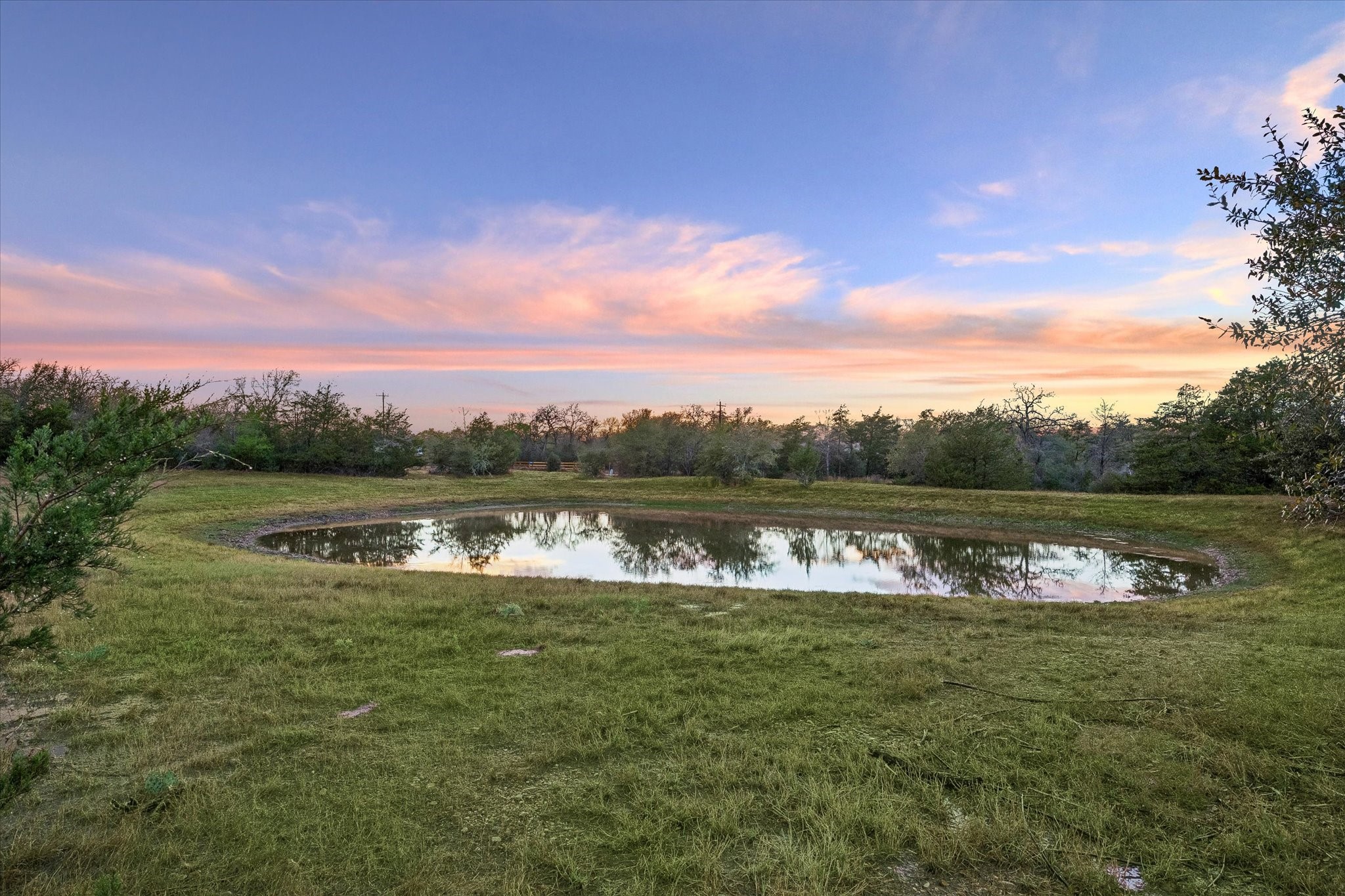 895 South Weyand Road Round Top, TX 78954 - Photo 22 of 37 a view of lake with green space