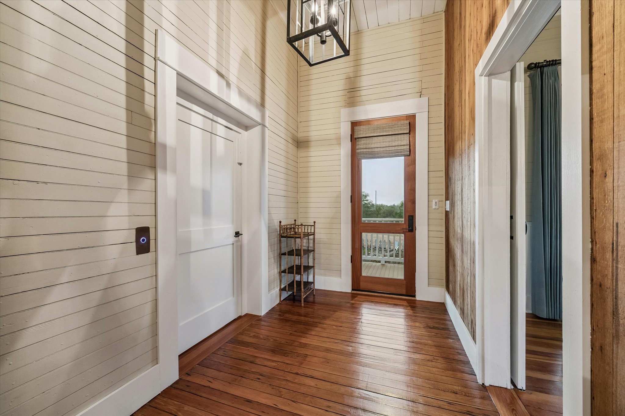 895 South Weyand Road Round Top, TX 78954 - Photo 23 of 37 a view of a hallway with wooden floor