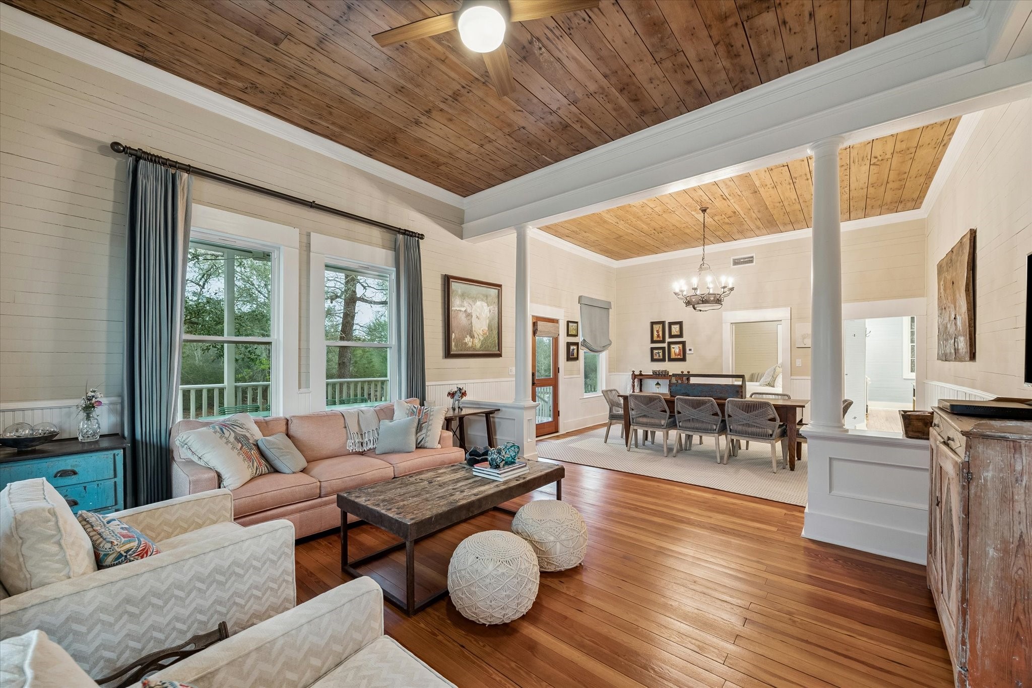 895 South Weyand Road Round Top, TX 78954 - Photo 3 of 37 a living room with furniture wooden floor and a fireplace