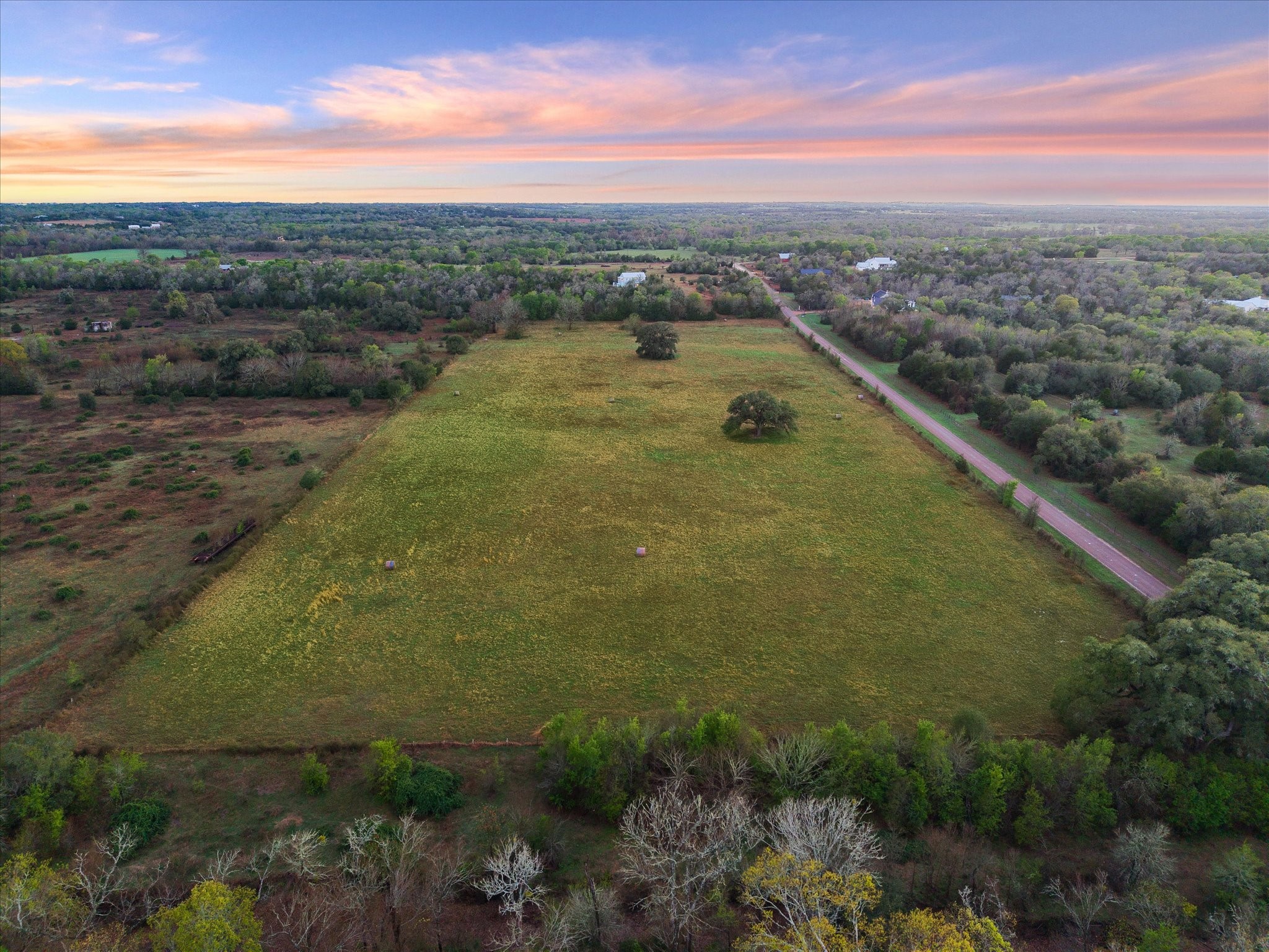 895 South Weyand Road Round Top, TX 78954 - Photo 10 of 37 a view of a lake with a city