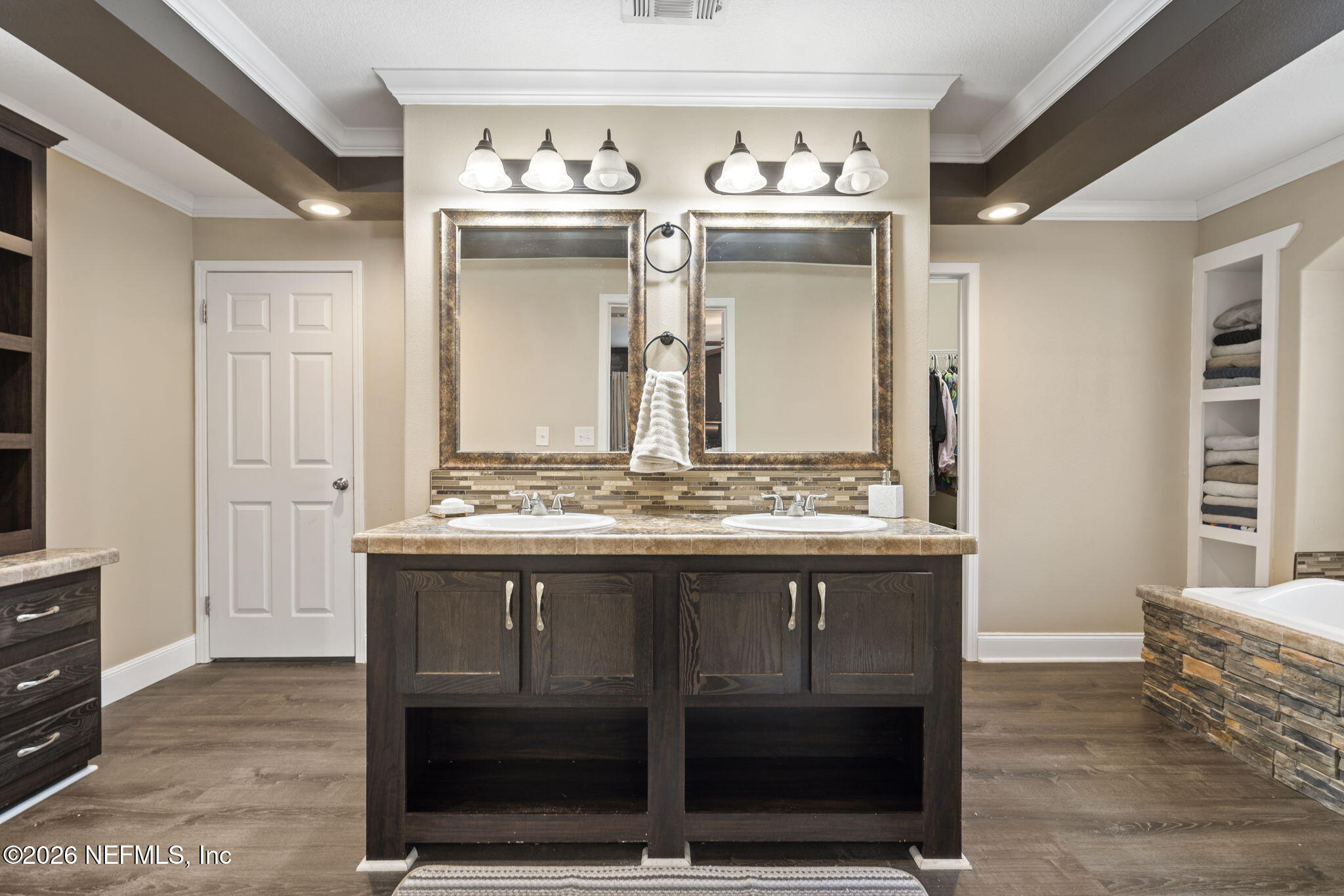 540605 Lem Turner Road Callahan, FL 32011 - Photo 20 of 31 a kitchen with stainless steel appliances granite countertop a stove and a refrigerator