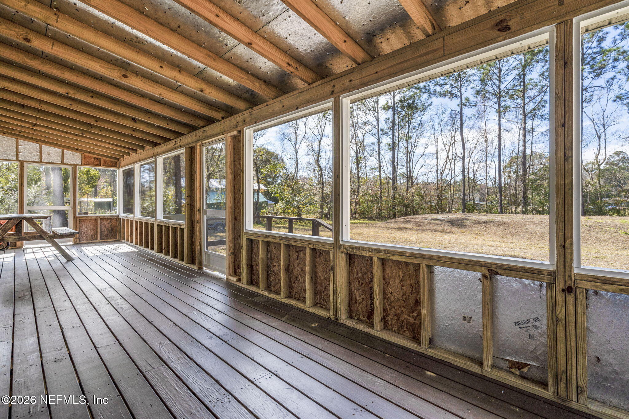 540605 Lem Turner Road Callahan, FL 32011 - Photo 24 of 31 a view of a balcony with wooden floor