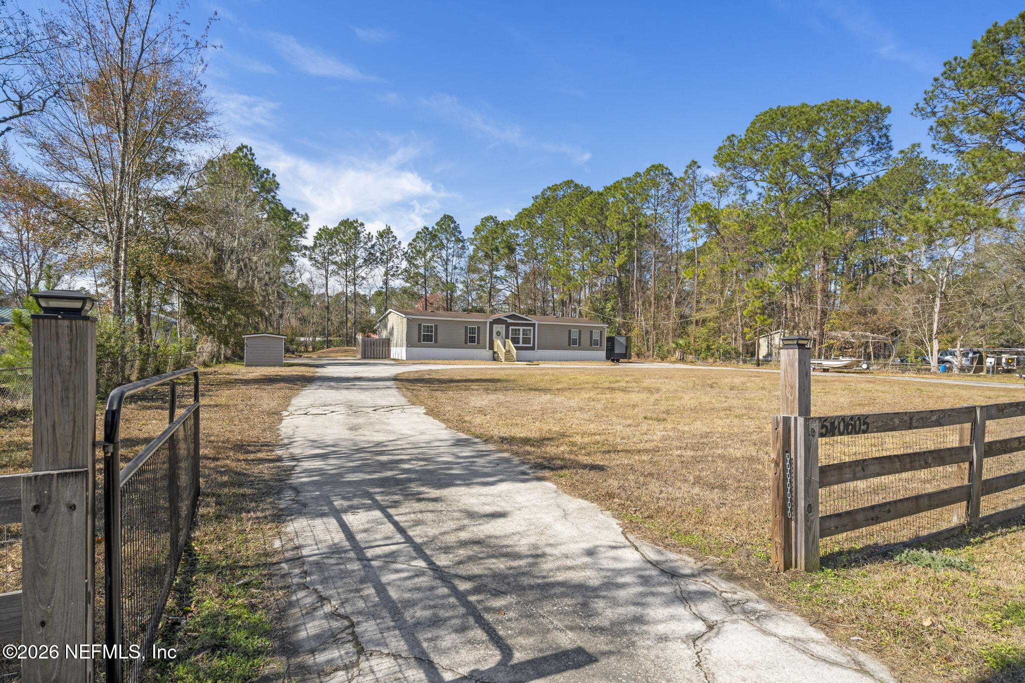 540605 Lem Turner Road Callahan, FL 32011 - Photo 30 of 31 a view of a yard