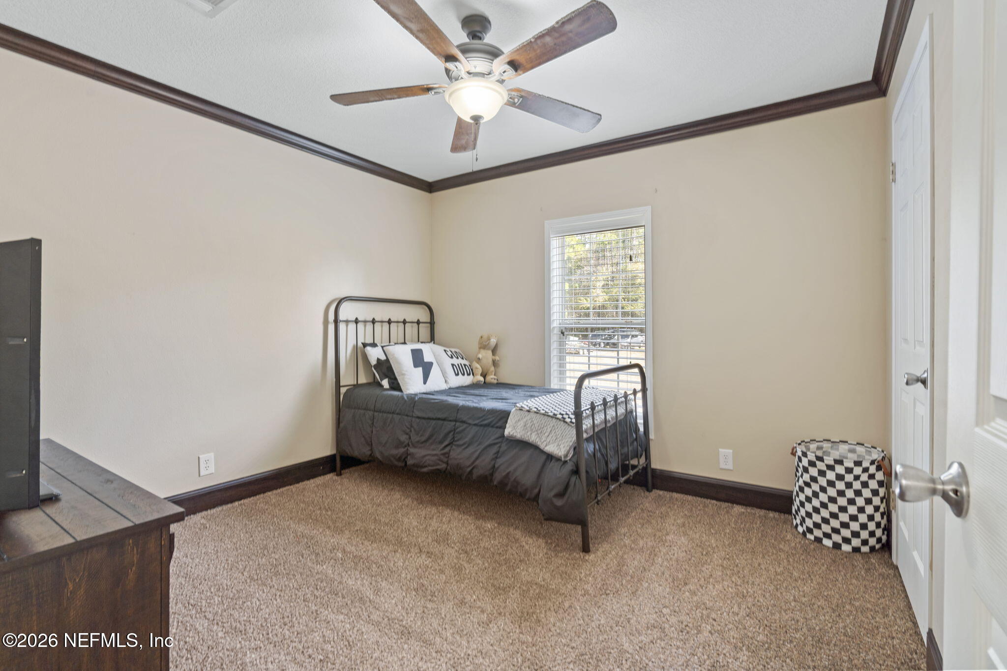 540605 Lem Turner Road Callahan, FL 32011 - Photo 9 of 31 a room with a bed furniture and a window