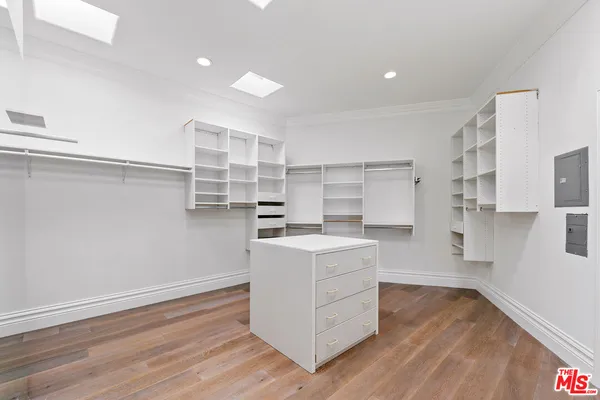 a view of a balcony with furniture