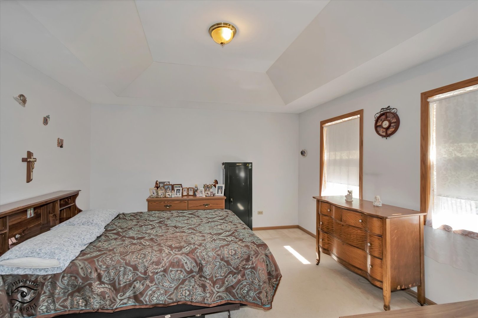 930 Meadowbrook Road Elwood, IL 60421 - Photo 12 of 25 a bedroom with a bed and dresser with mirror