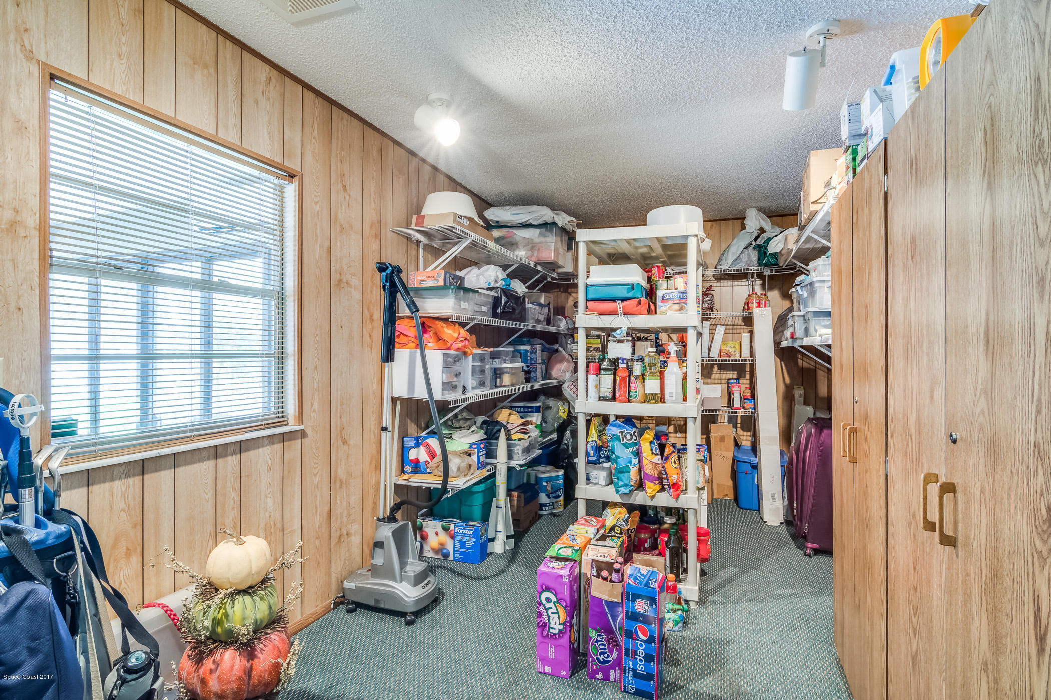2660 Rocky Point Road Malabar, FL 32950 - Photo 37 of 71 Under AC workshop/storage