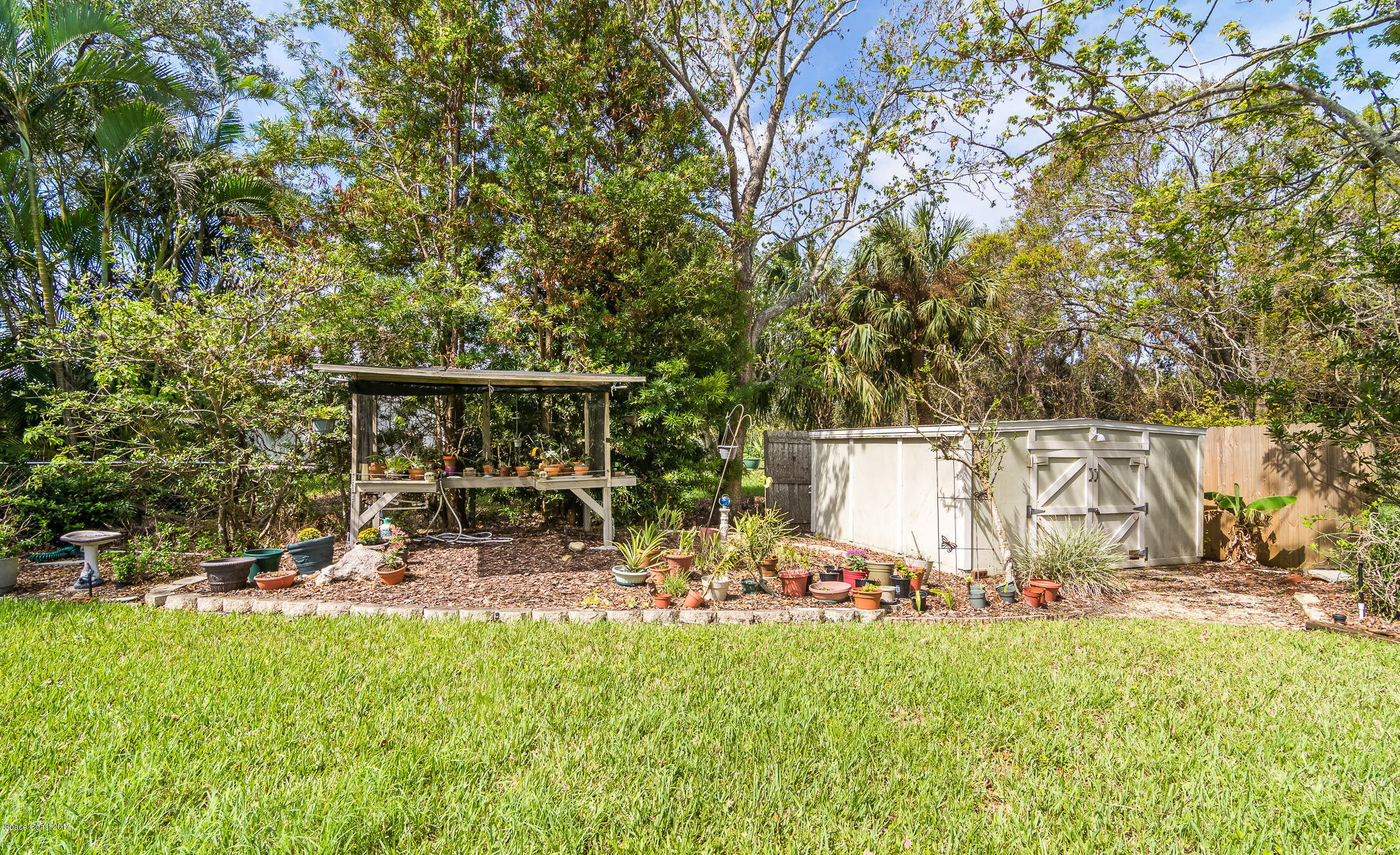 2660 Rocky Point Road Malabar, FL 32950 - Photo 45 of 71 Storage Shed/Gardening Area