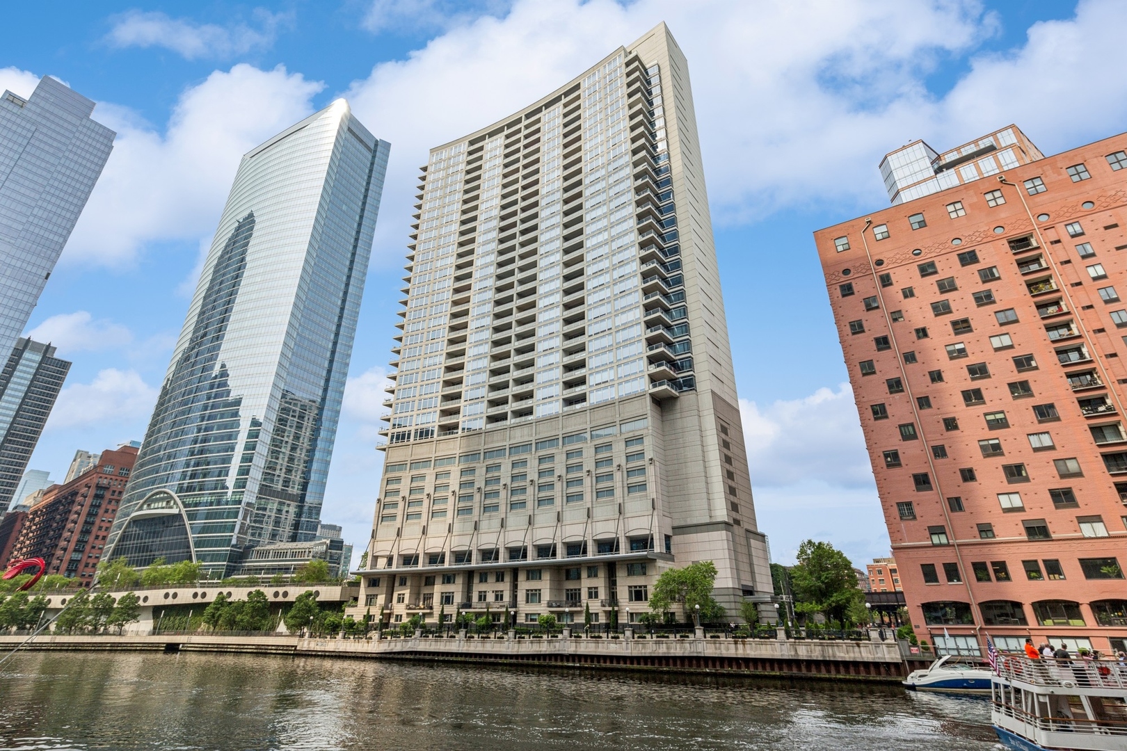 333 North Canal Street, Unit 2505 Chicago, IL 60606 - Photo 2 of 17 a view of balcony with a lake view and tall buildings