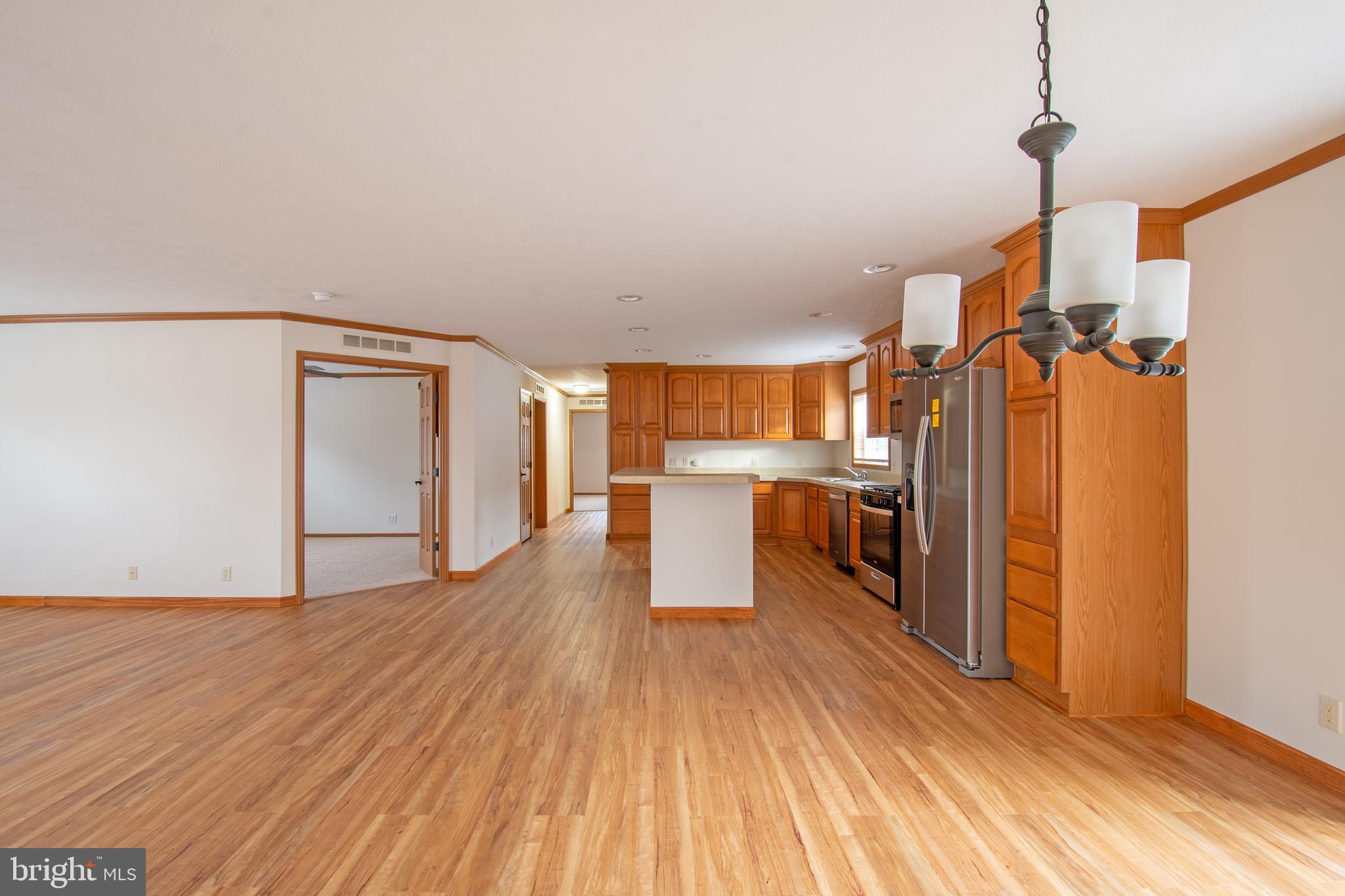 116 Lavender Lane, Unit 4 Magnolia, DE 19962 - Photo 11 of 26 a view of a kitchen with wooden floor