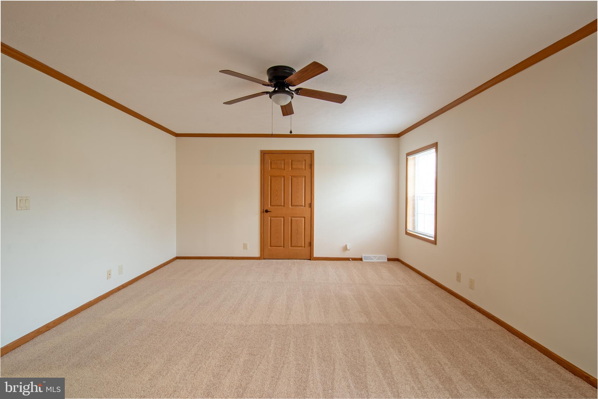 116 Lavender Lane, Unit 4 Magnolia, DE 19962 - Photo 21 of 26 a view of an empty room with a window