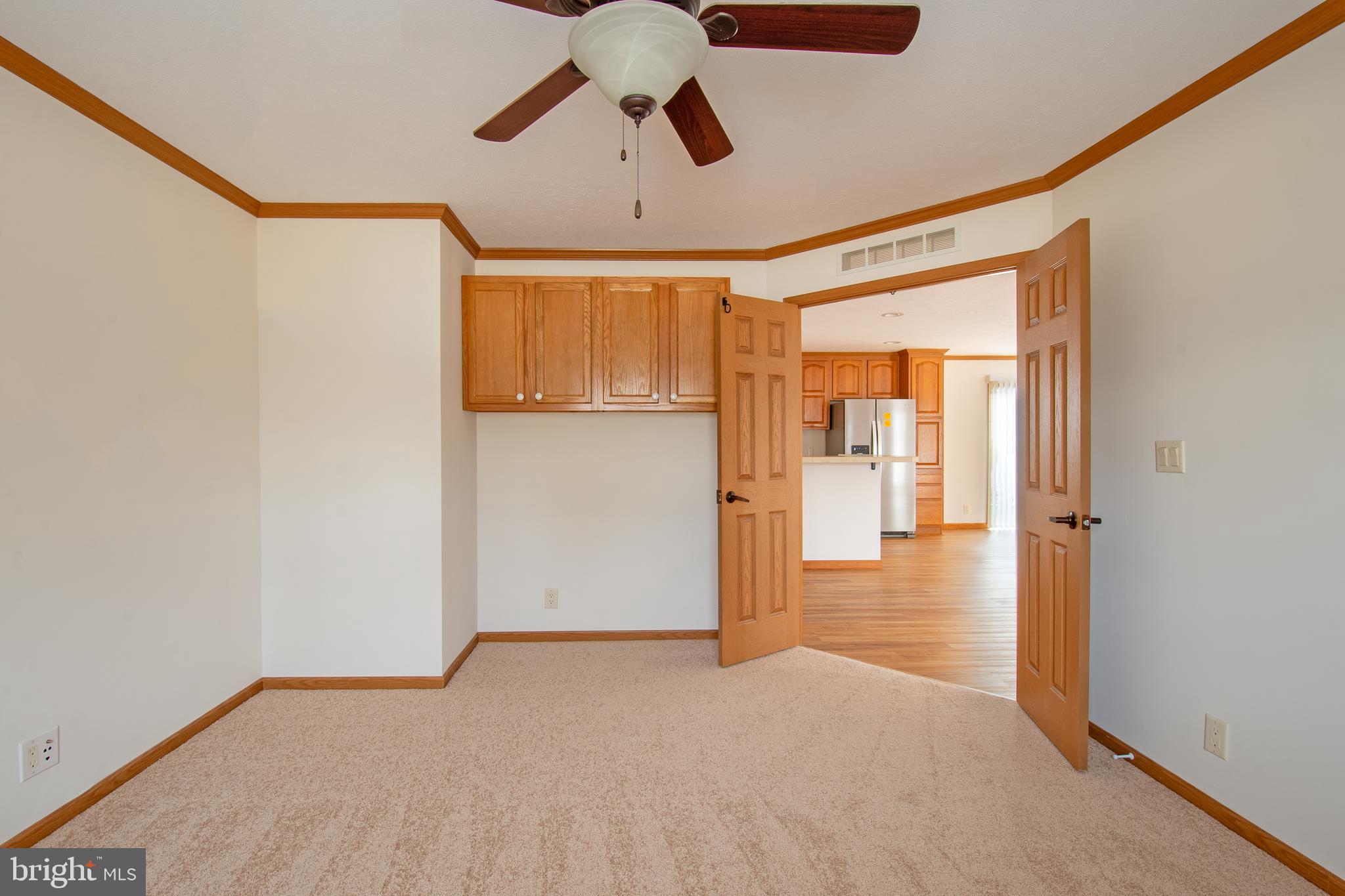 116 Lavender Lane, Unit 4 Magnolia, DE 19962 - Photo 26 of 26 a view of a hallway with a chandelier