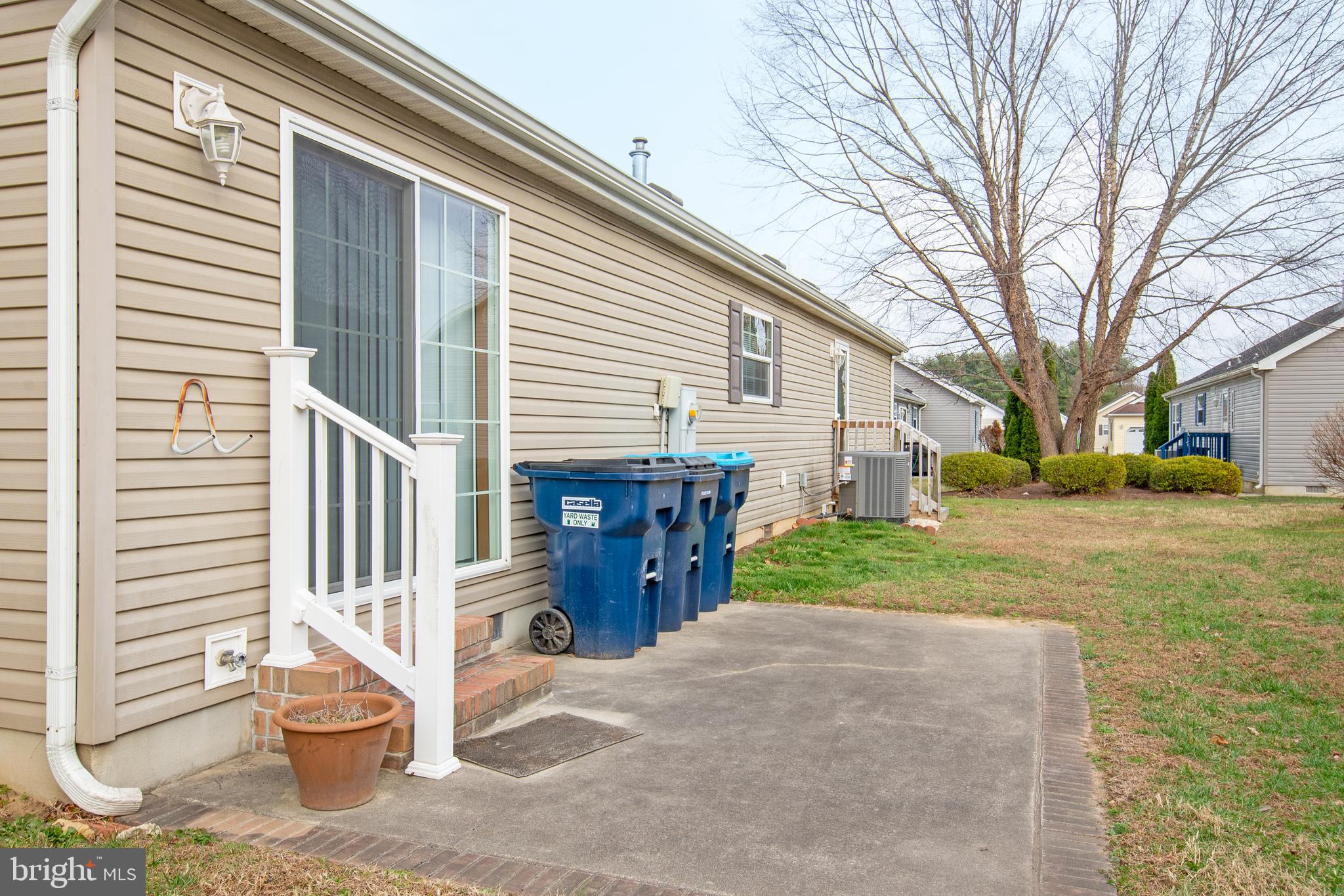 116 Lavender Lane, Unit 4 Magnolia, DE 19962 - Photo 4 of 26 a view of a house with a yard