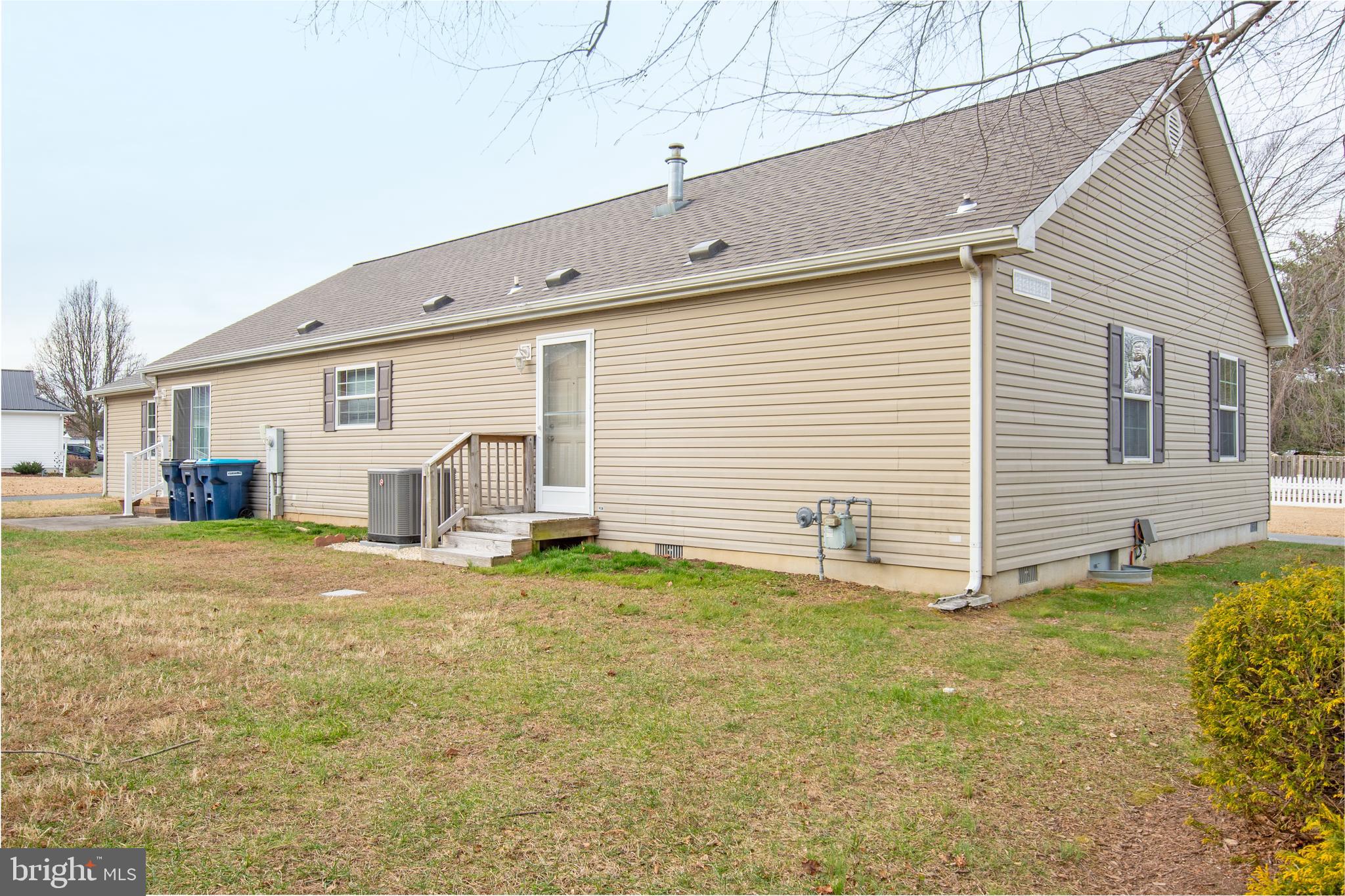 116 Lavender Lane, Unit 4 Magnolia, DE 19962 - Photo 5 of 26 a view of a house with backyard and a yard